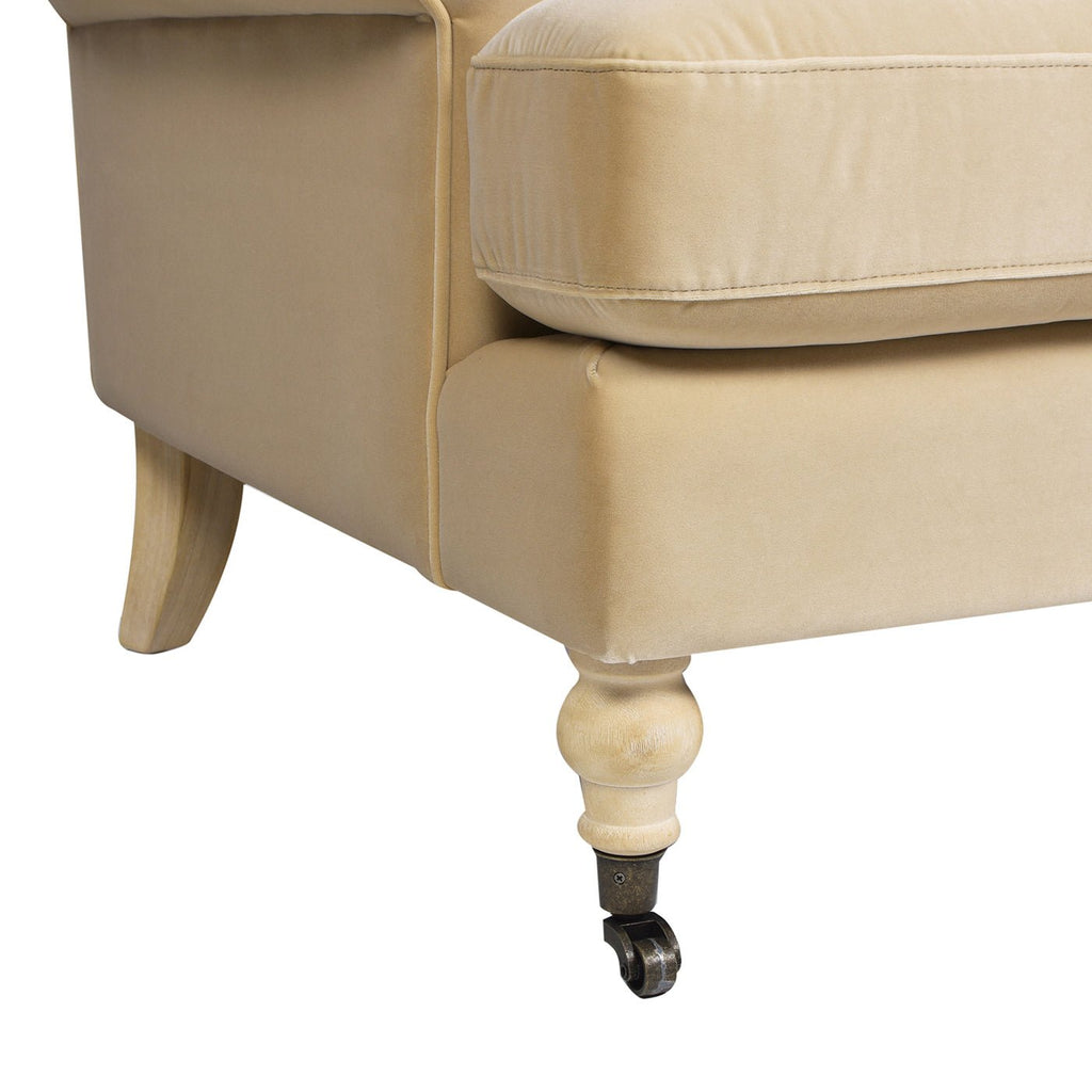 Cobaltex Upholstered Arm Chair with Metal Casters and Rolled Arms