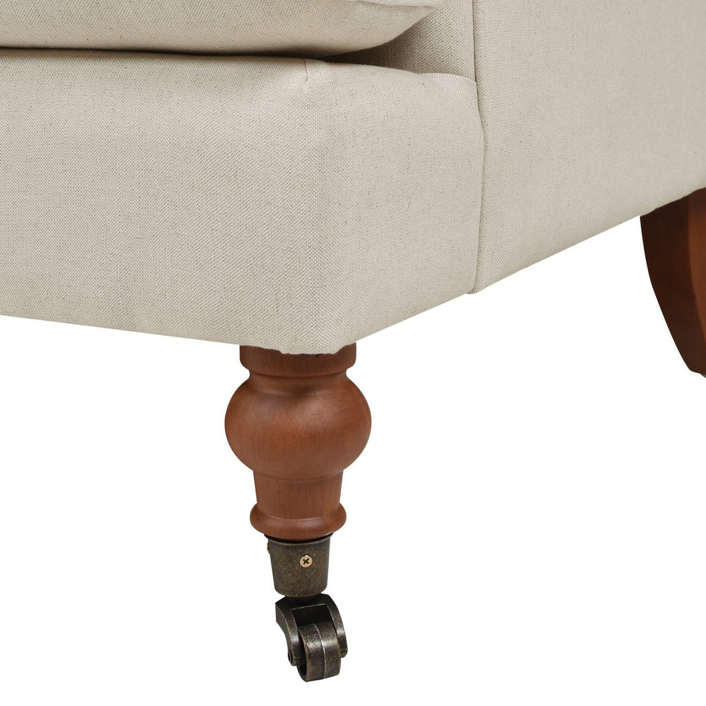 Cobaltex Upholstered Arm Chair with Metal Casters and Rolled Arms